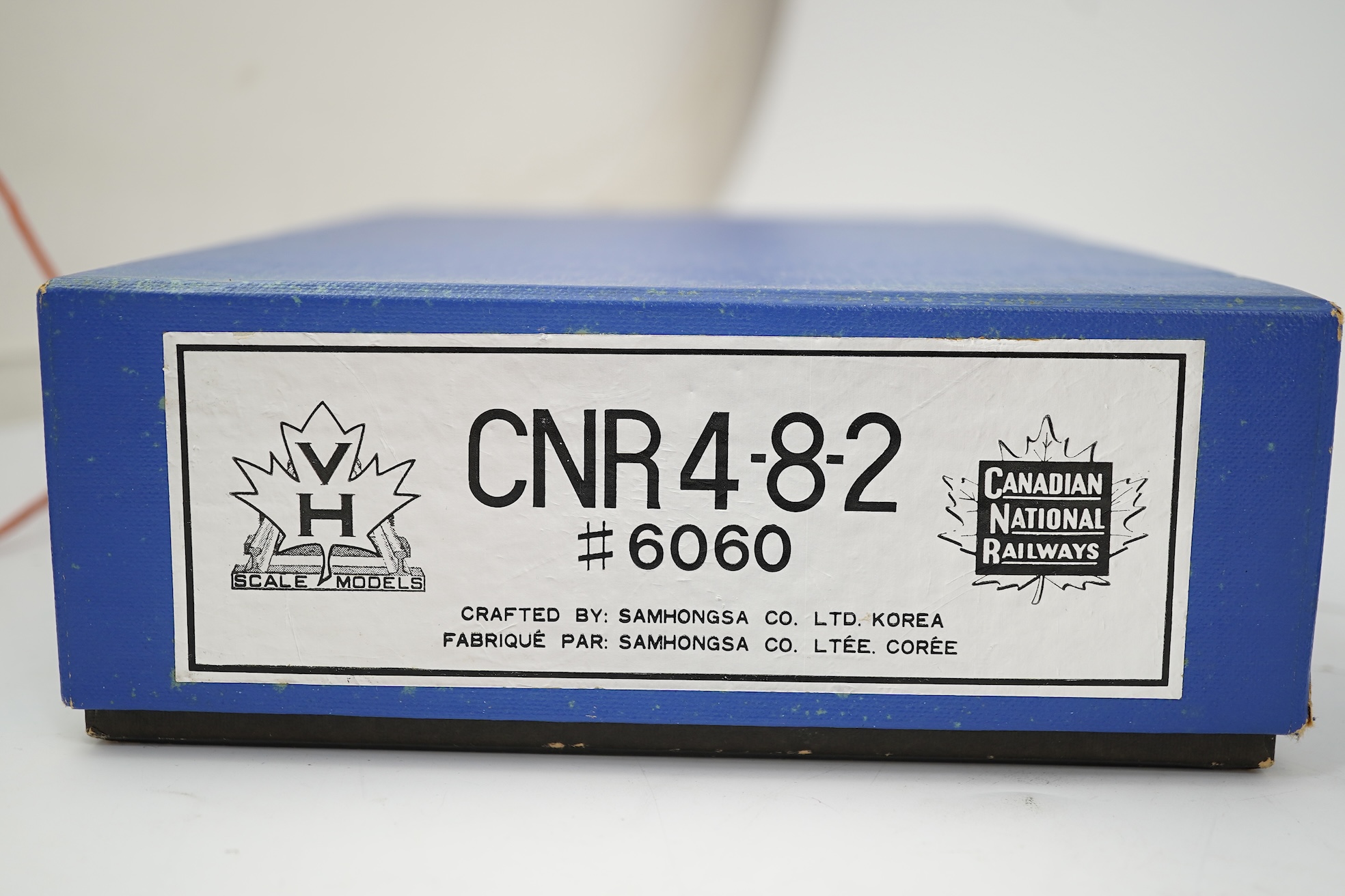 A boxed HO gauge VH Scale Models model of Canadian National Railways 6060, 4-8-2 locomotive with bogie tender, powered for two rail operation.